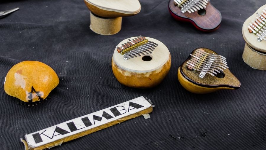 A kalimba (mbira, sanza) displayed against a black background.