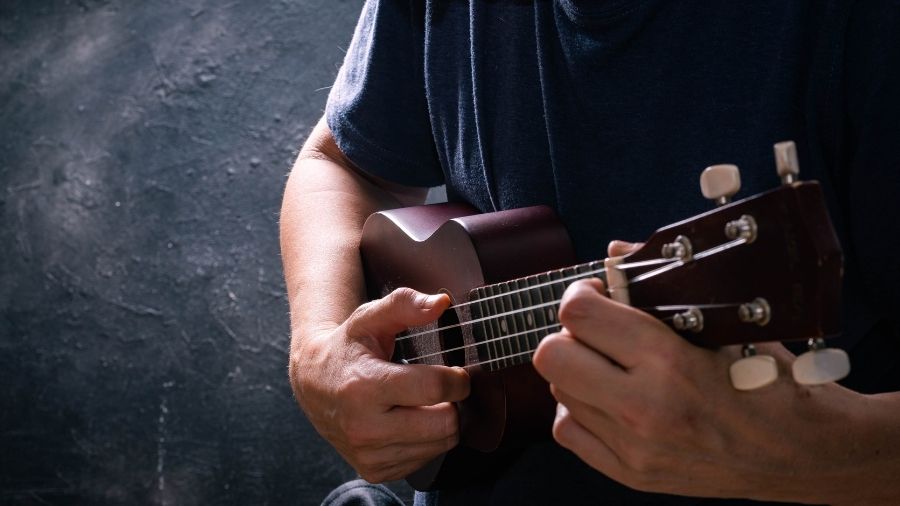 Man playing Ukelele