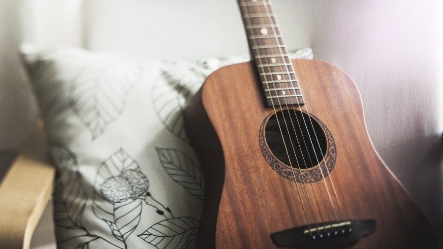 Natural wood grain acoustic guitar