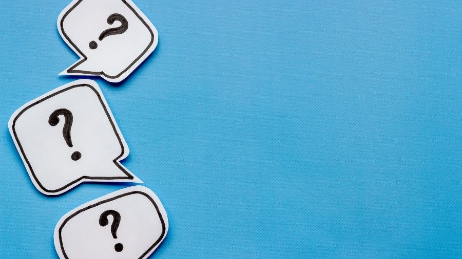 Question marks in speech bubbles graphic
