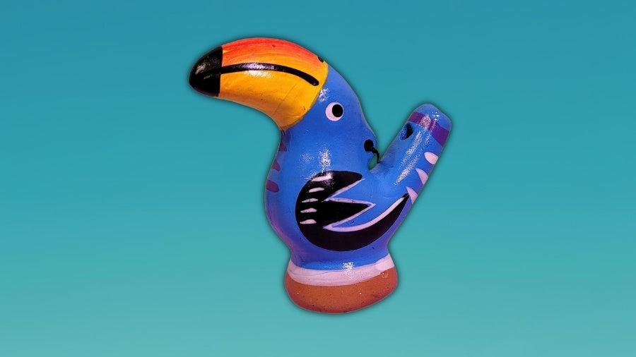 Toucan Water Whistle on a blue gradient background