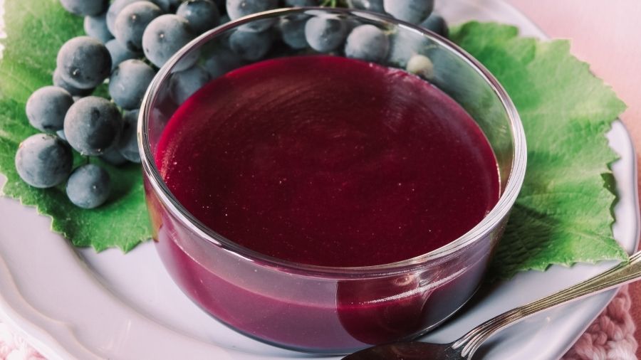 Bowl of Traditional Italian Sùgoli Grape Pudding