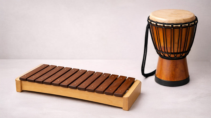 wooden xylophone next to a djembe drum