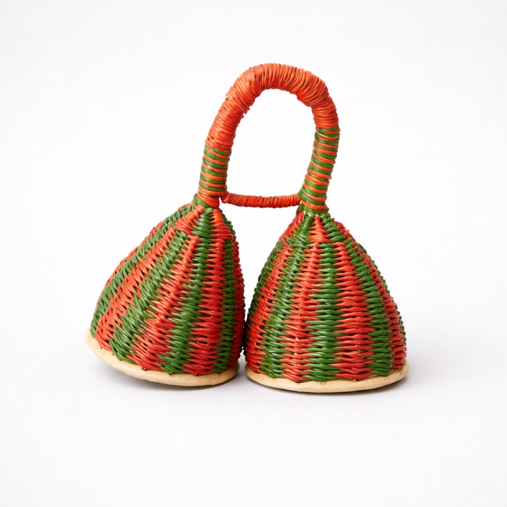 Handwoven orange and green double caxixi basket shaker from Africa on a white studio background