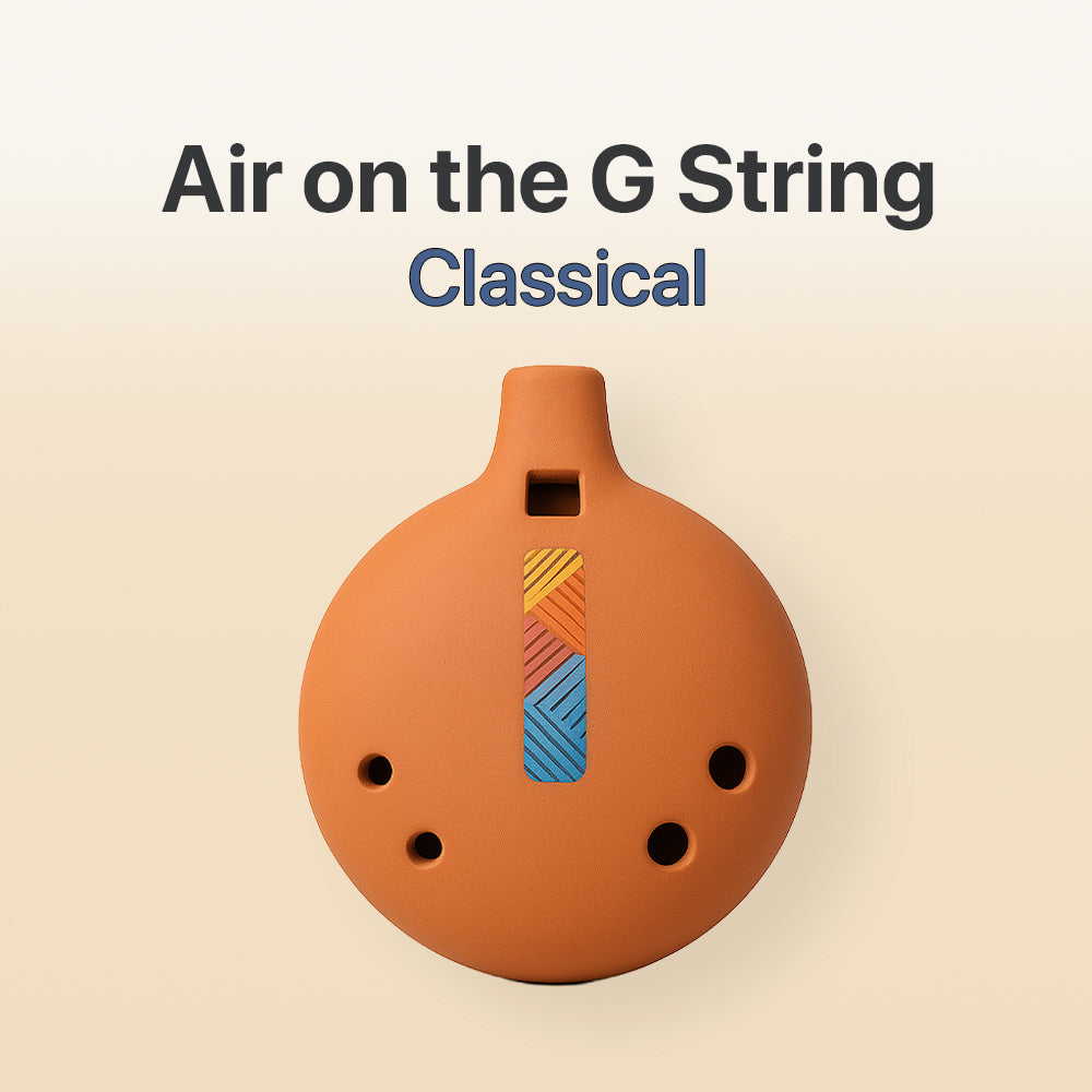 Ceramic ocarina with colorful design on a beige background, labeled 'Air on the G String Classical'.