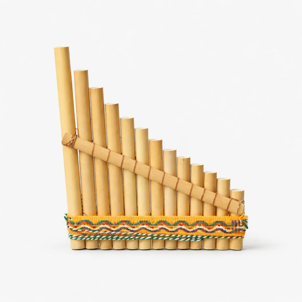 Handcrafted Antares Bamboo panpipes from Peru with decorative band on a white background