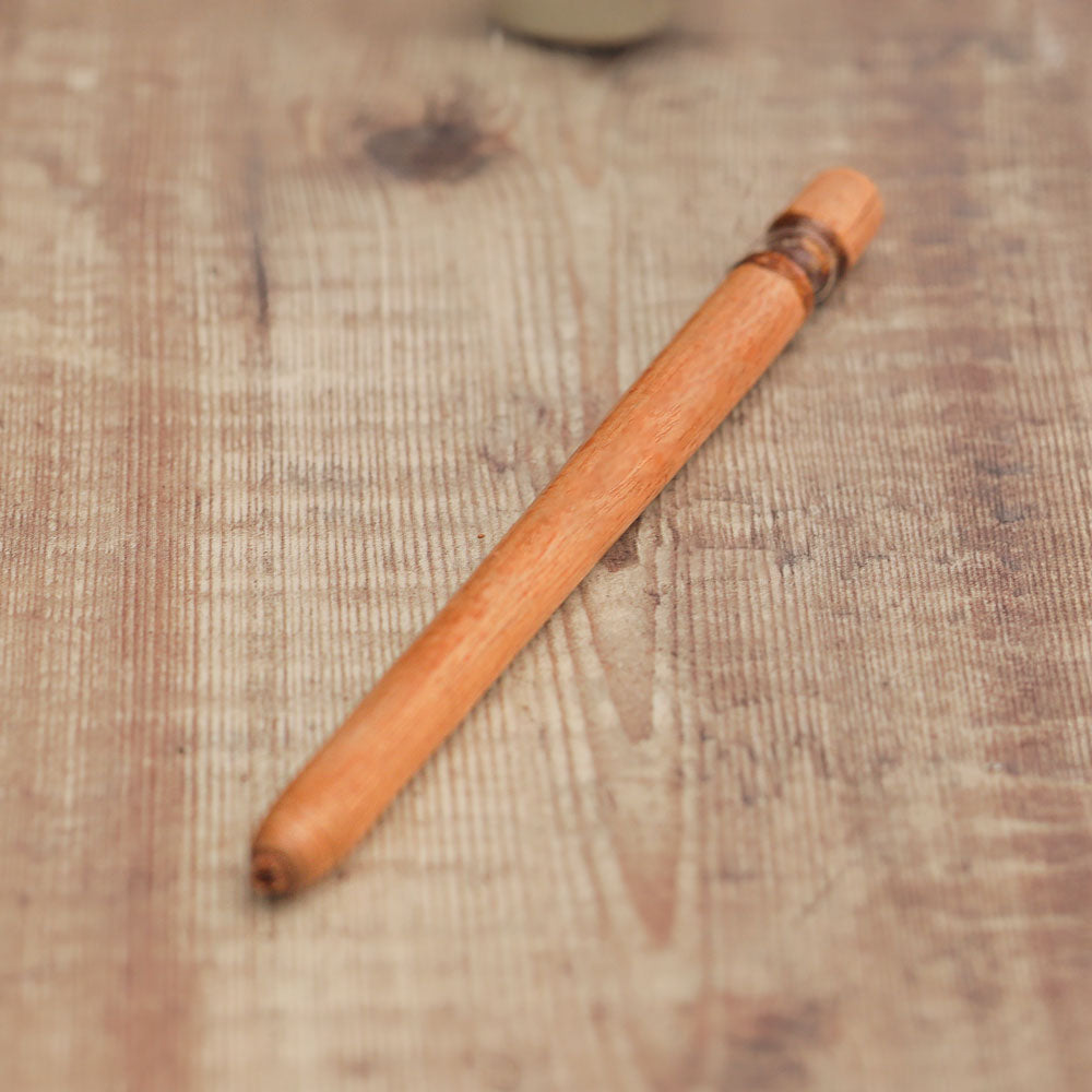 A close up of a beater of the Cicadas Imitator