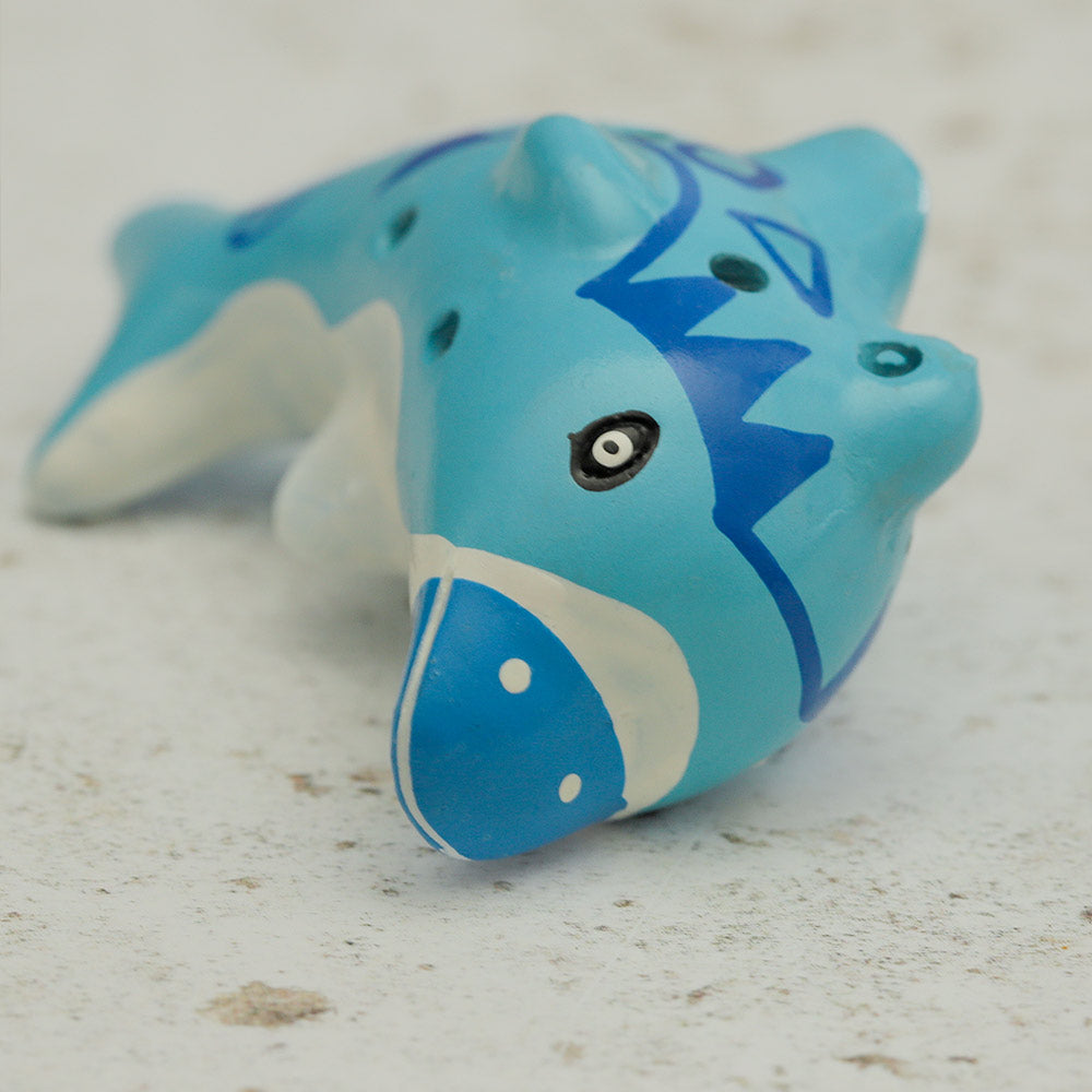 Close up of the painted dolphin ocarina face showing detail