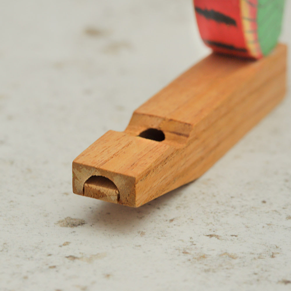 Close up of the Mesari bird whistle wooden mouth piece