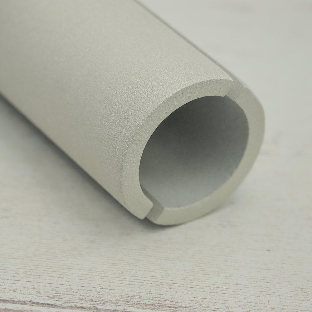 Close up of the kutawapa wah wah tubes showing the end of the metal instrument