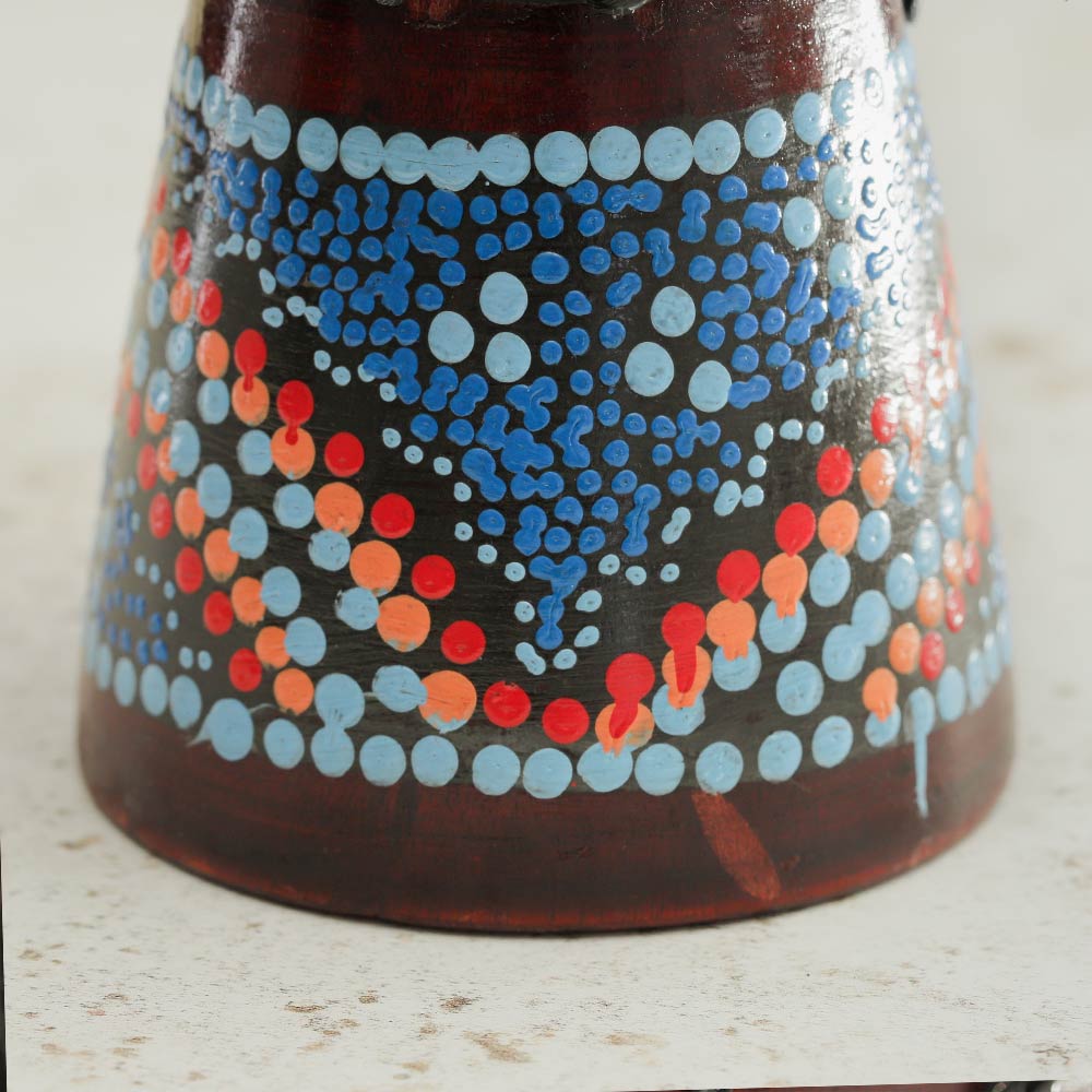 Close up of the hand painted dot pattern design on the pura djembe drum