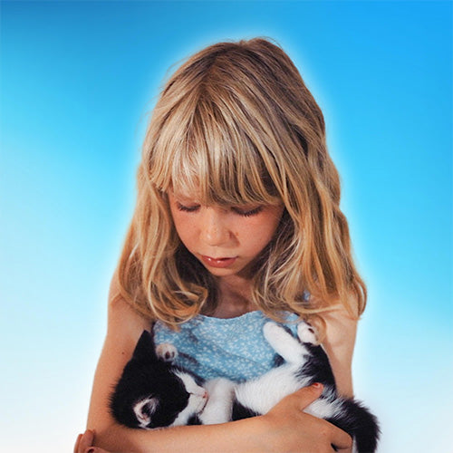 Lola holding fluffy kitten