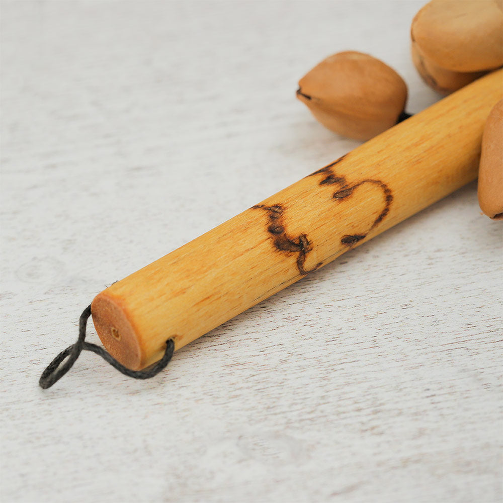 Close-up of the Lima Kenari Stick Shaker handle, showcasing its detailing and natural texture.