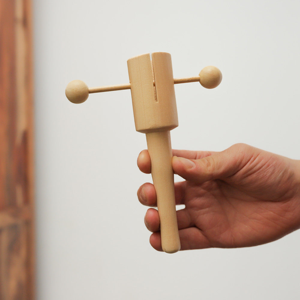 Matsu T clacker percussion instrument made from solid wood, handheld for rhythmic sound.
