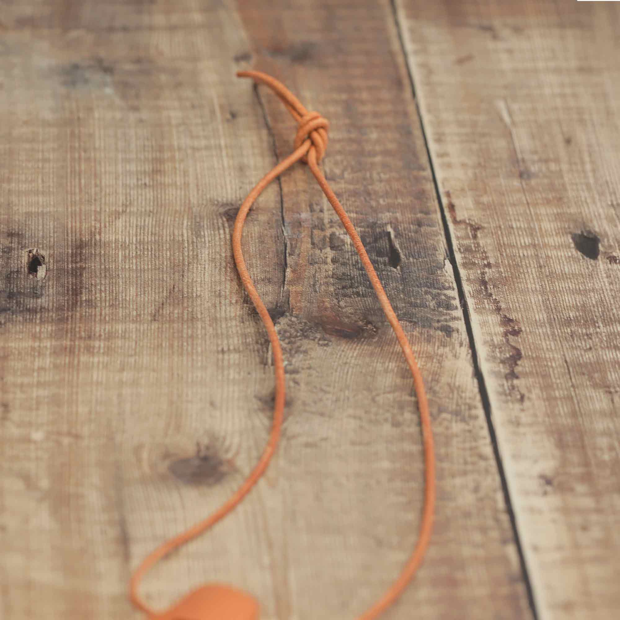 A close up of the string of the Ocarina Pro Alto