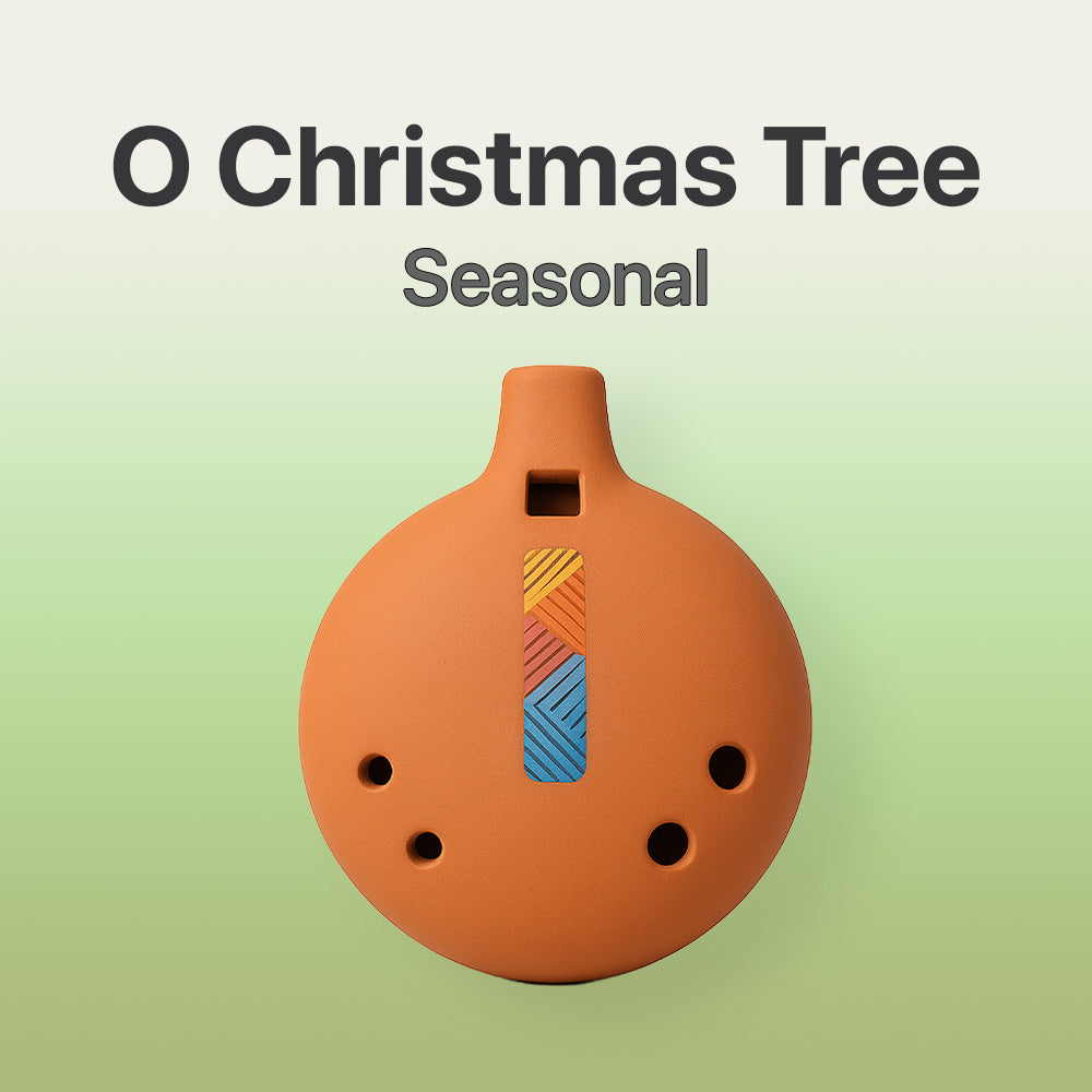 Terracotta-colored ocarina with geometric design on a light green background, featuring text 'O Christmas Tree Seasonal'.