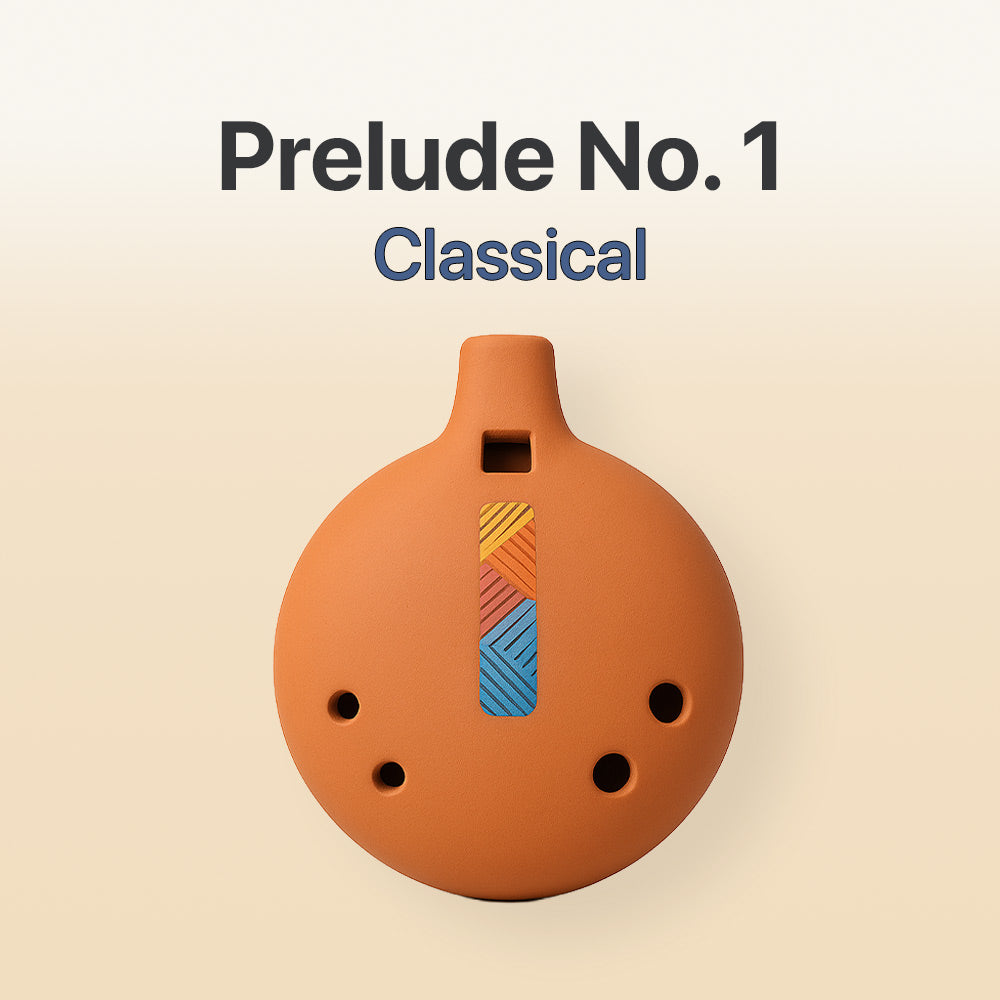 Ceramic ocarina with colorful design on a beige background, labeled 'Prelude No. 1 Classical'.
