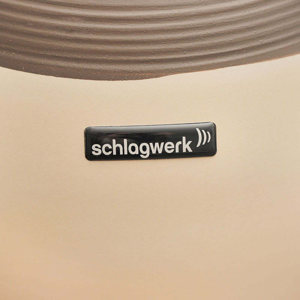 close up of udu drum logo