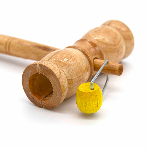 Extreme close up of the wooden knocker instrument