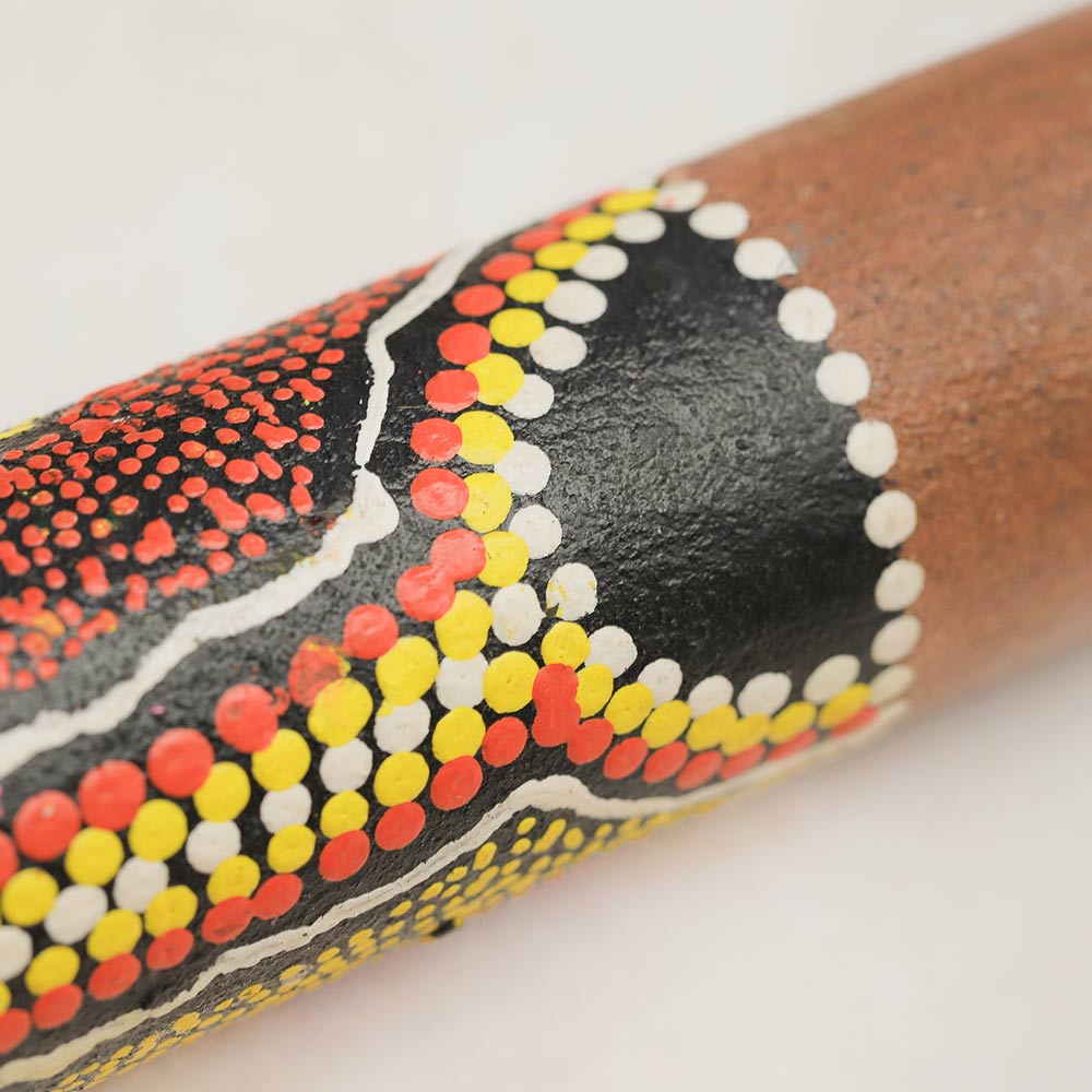 dot painting of bamboo rainstick