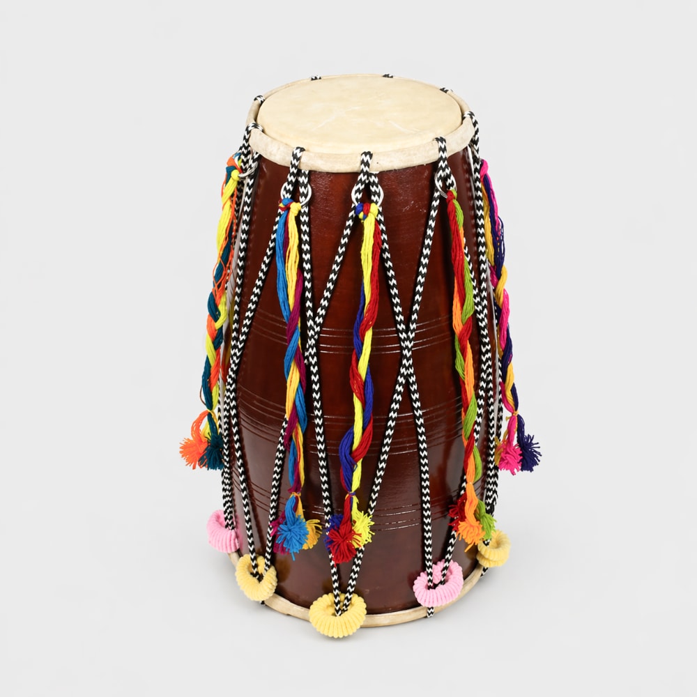 large fancy dhol drum with colourful string