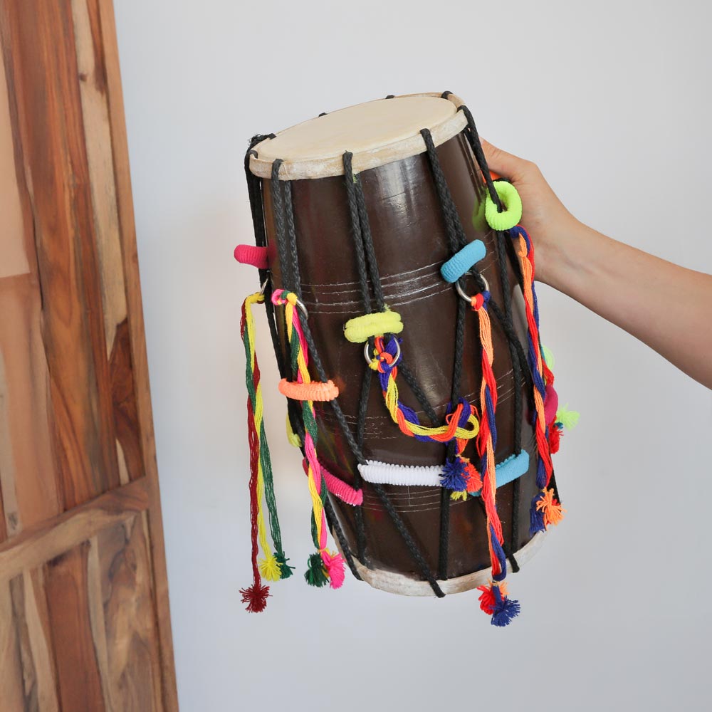 image of fancy dholak indian drum in hand