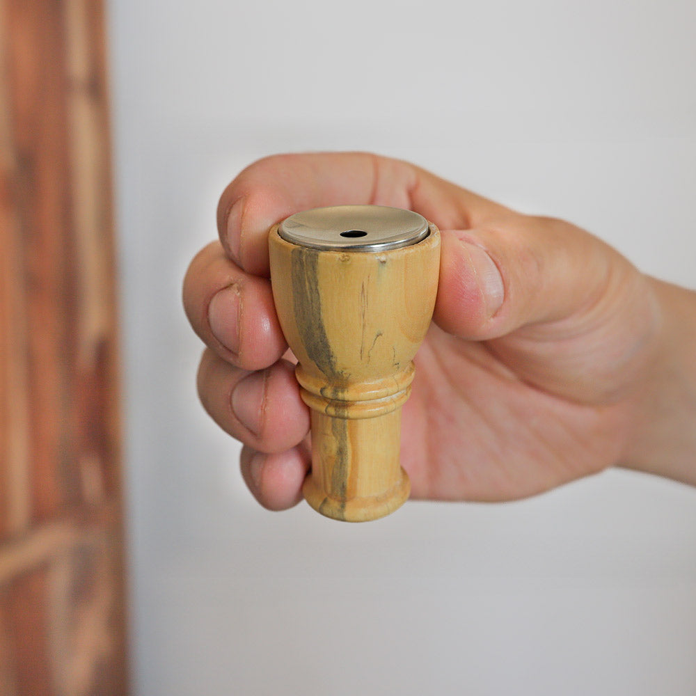 small wooden and metal partridge scale in hand image