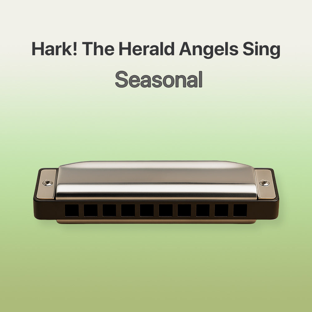 Harmonica on a light green background with text 'Hark! The Herald Angels Sing Seasonal'.