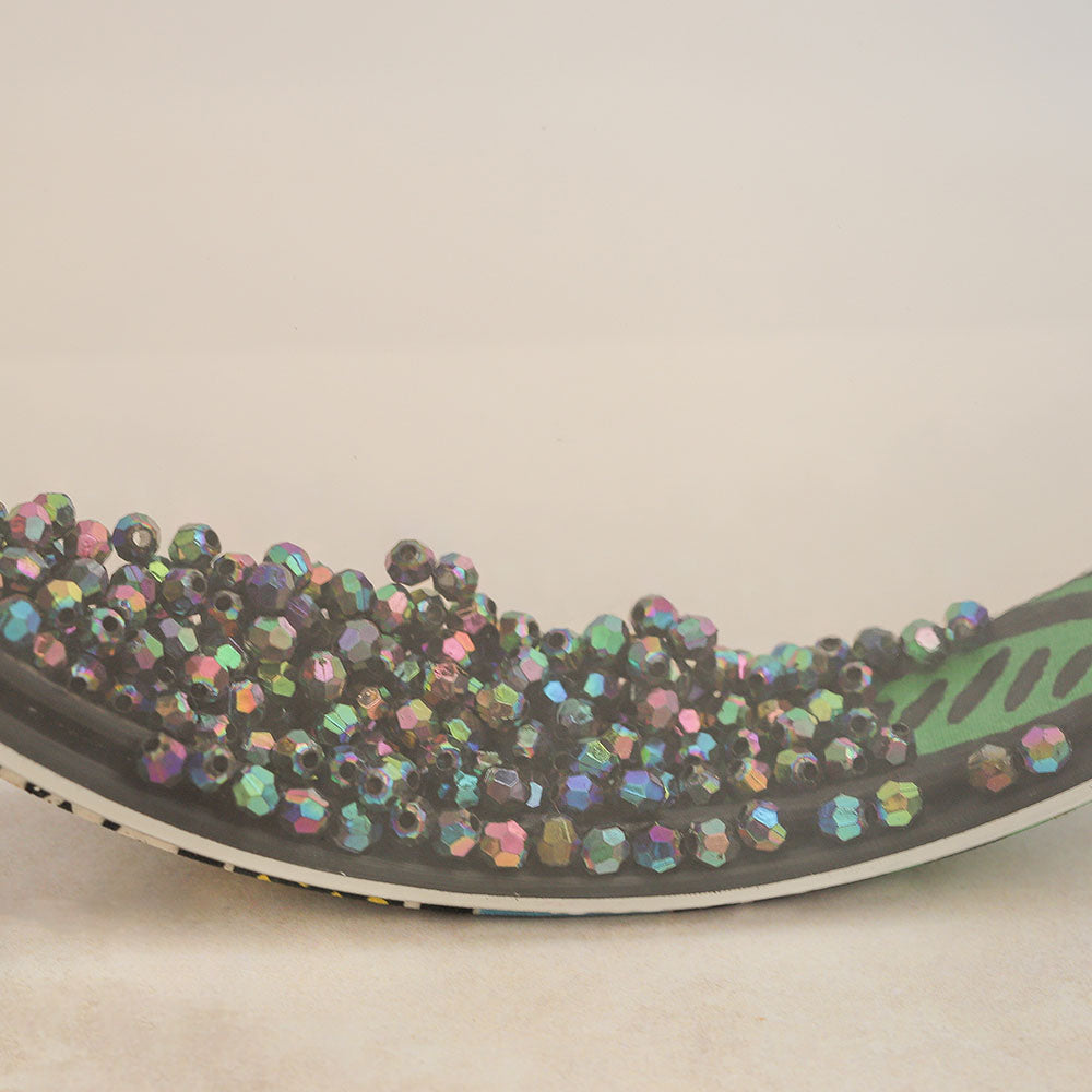 close up of tidal ocean drum beads