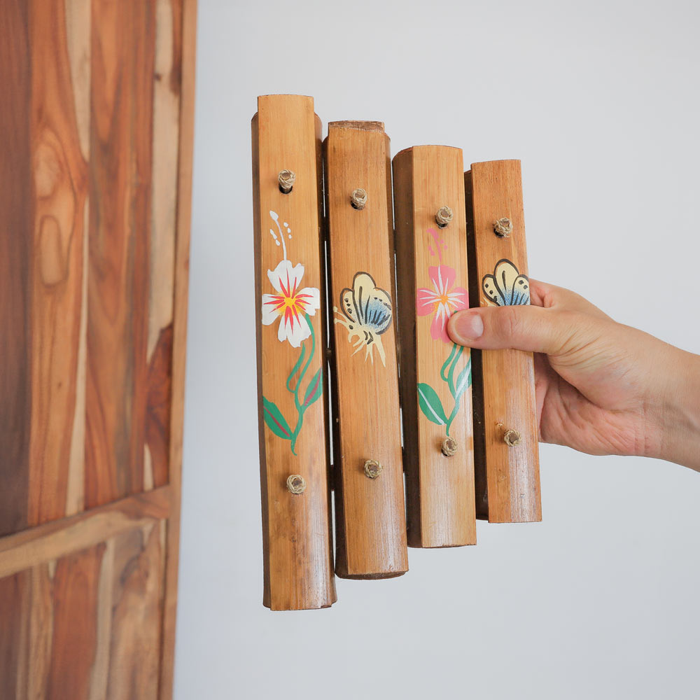 rindik bunga Indonesian xylophone 4 note in hand