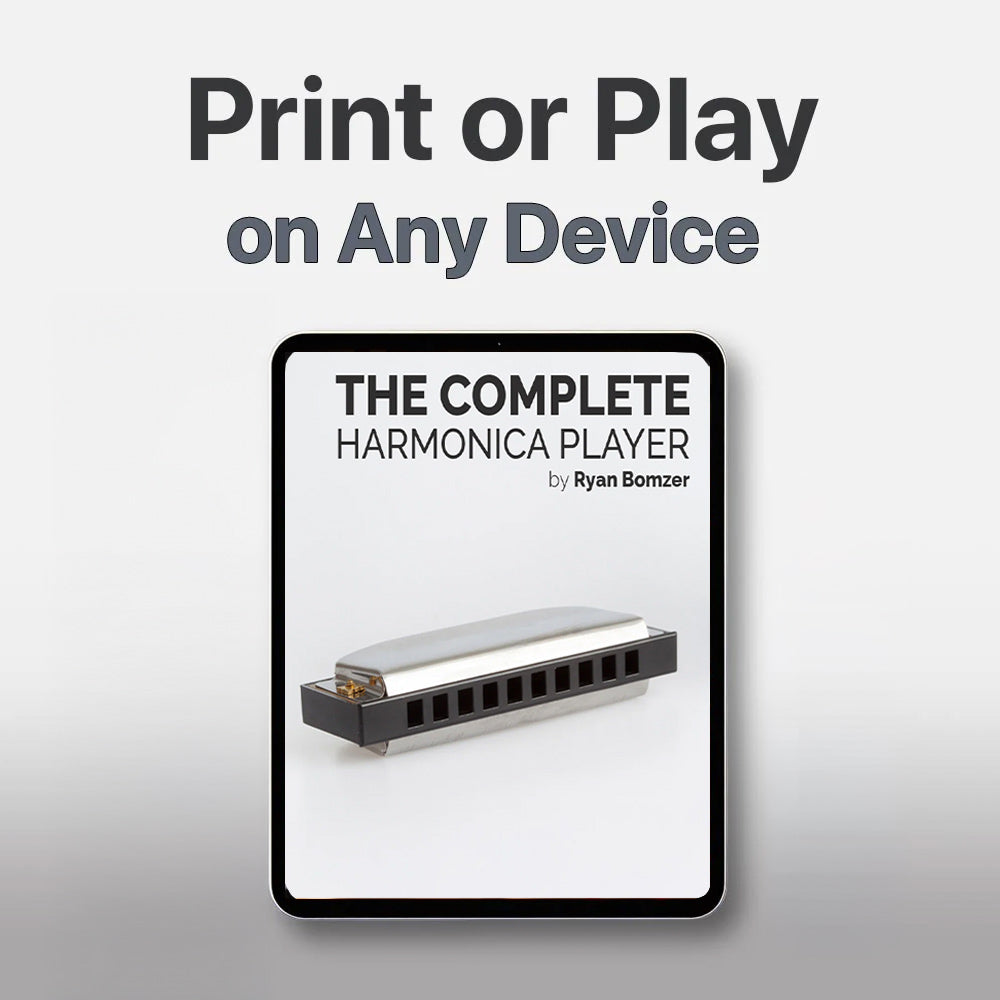 Book titled 'The Complete Harmonica Player' by Ryan Bomzer with a harmonica on a gray background.