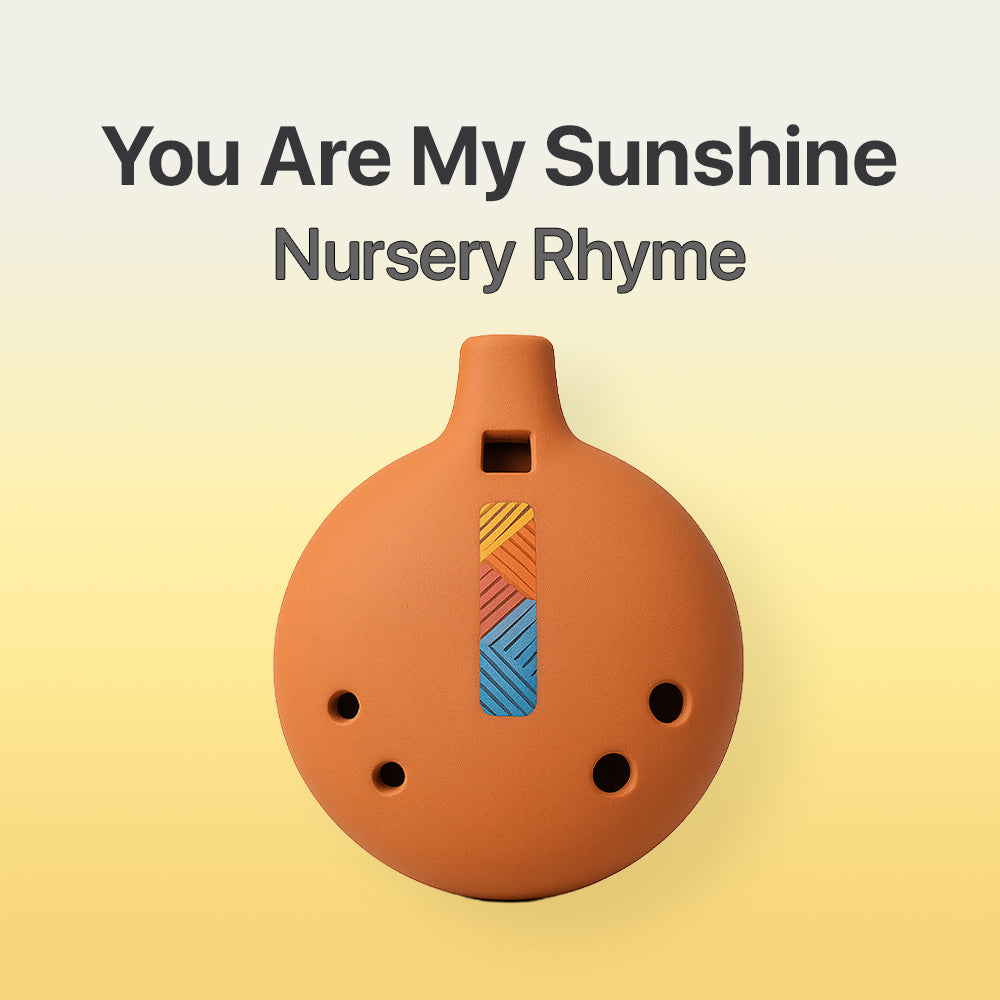 Terracotta-colored ocarina with colorful design on a gradient background, featuring text 'You Are My Sunshine Nursery Rhyme'.