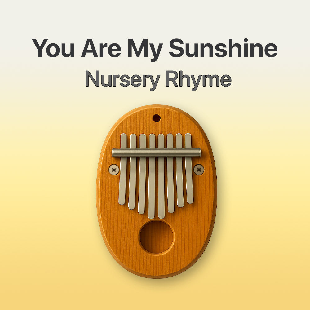 Wooden kalimba with text 'You Are My Sunshine Nursery Rhyme' on a yellow background