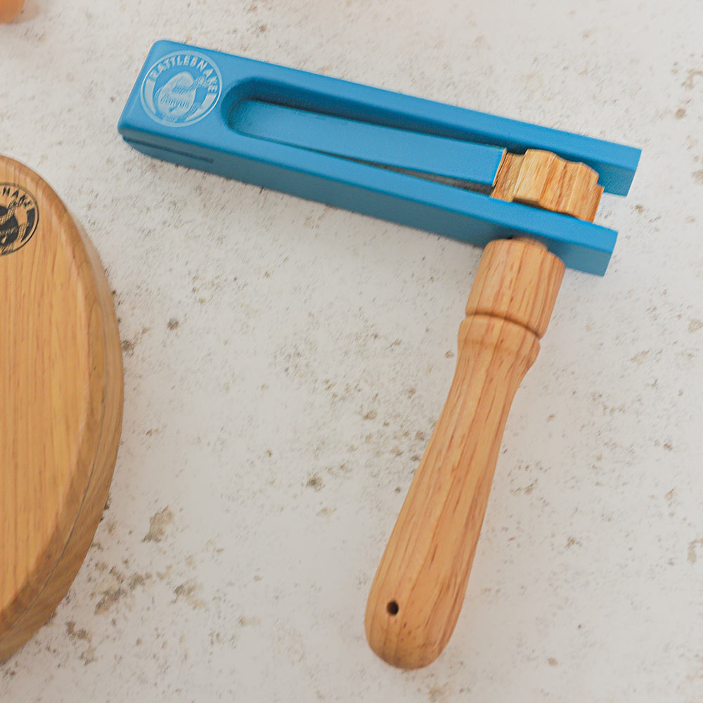 Close up of the Rattlesnake Percussion blue football ratchet
