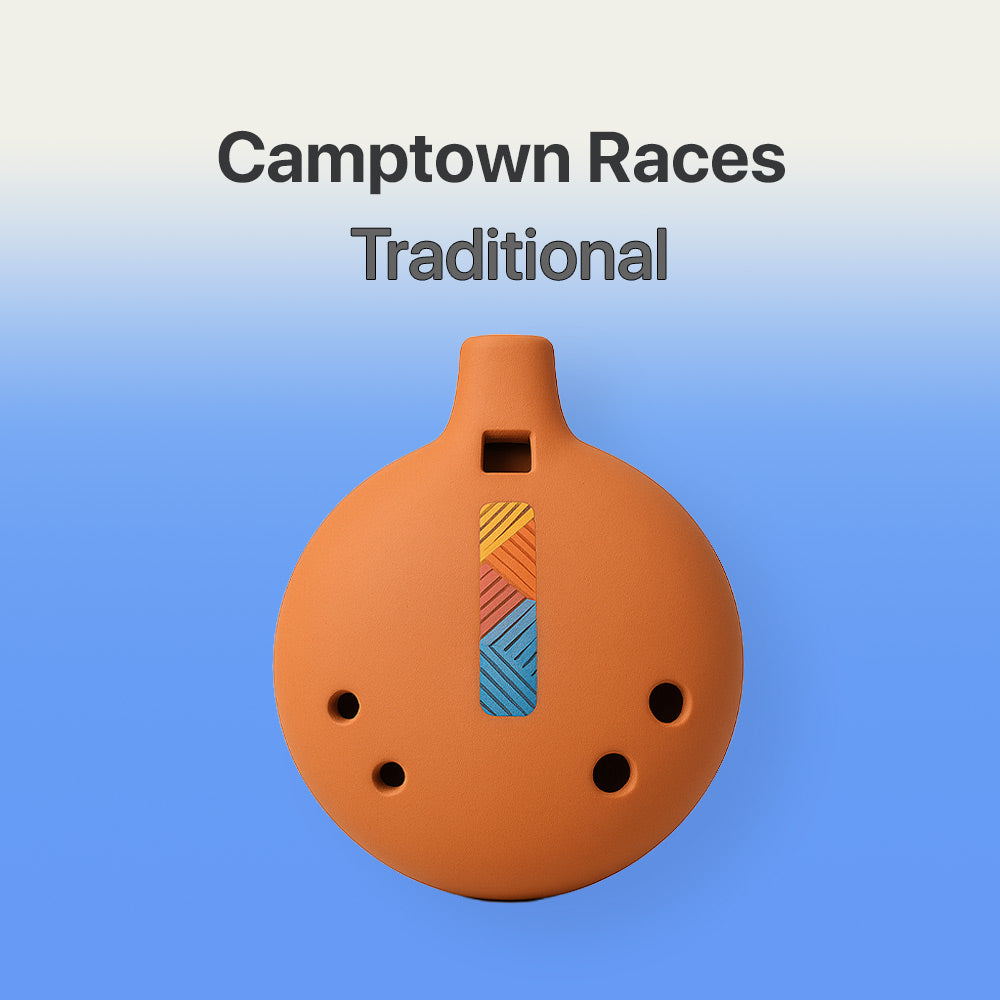 Camptown Races traditional clay Ocarina on a blue background