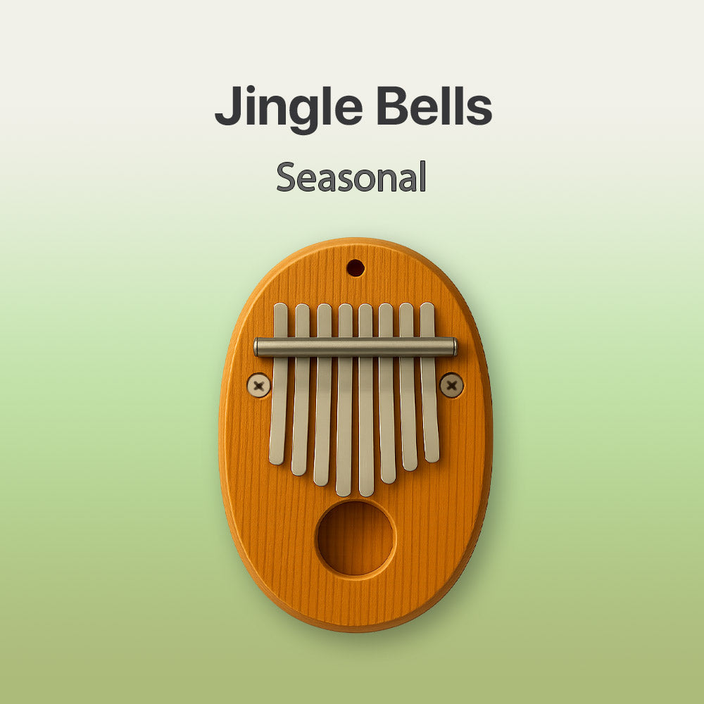 Wooden kalimba with metal tines on a green background, labeled 'Jingle Bells Seasonal'.