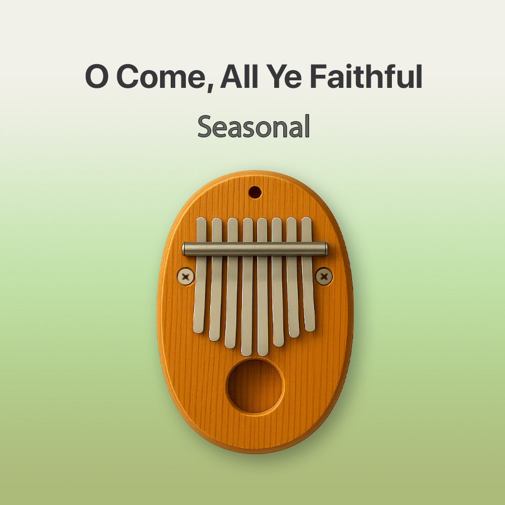 Wooden kalimba with 'O Come, All Ye Faithful' text on a green background