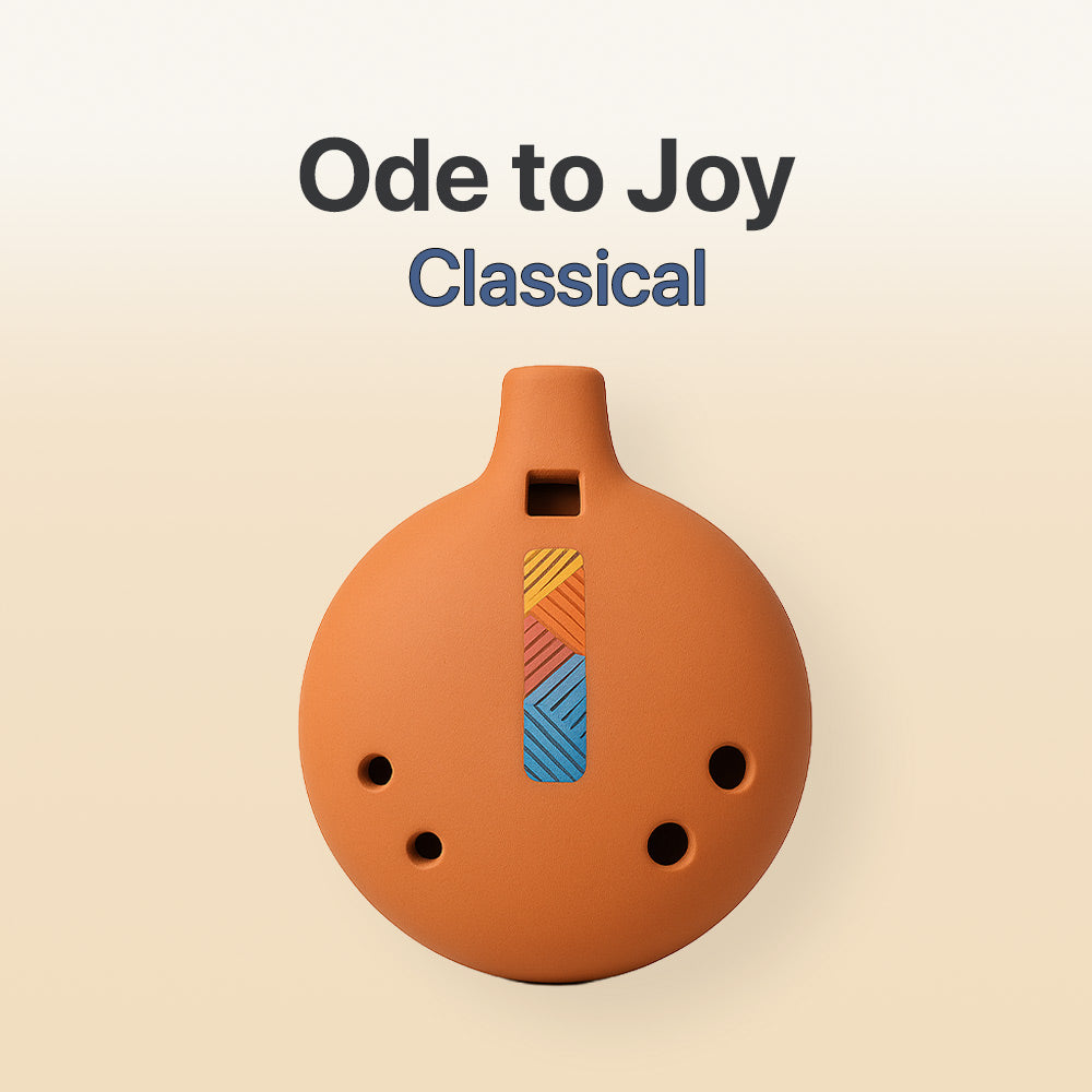 Ceramic ocarina with colorful design on a beige background, featuring the text 'Ode to Joy Classical'.