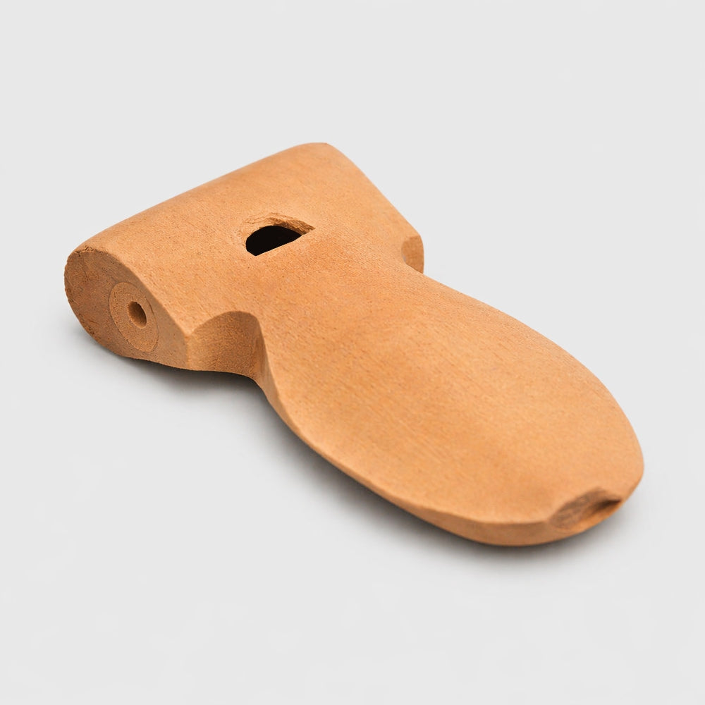 A close up photo of an Apito Samba whistle
