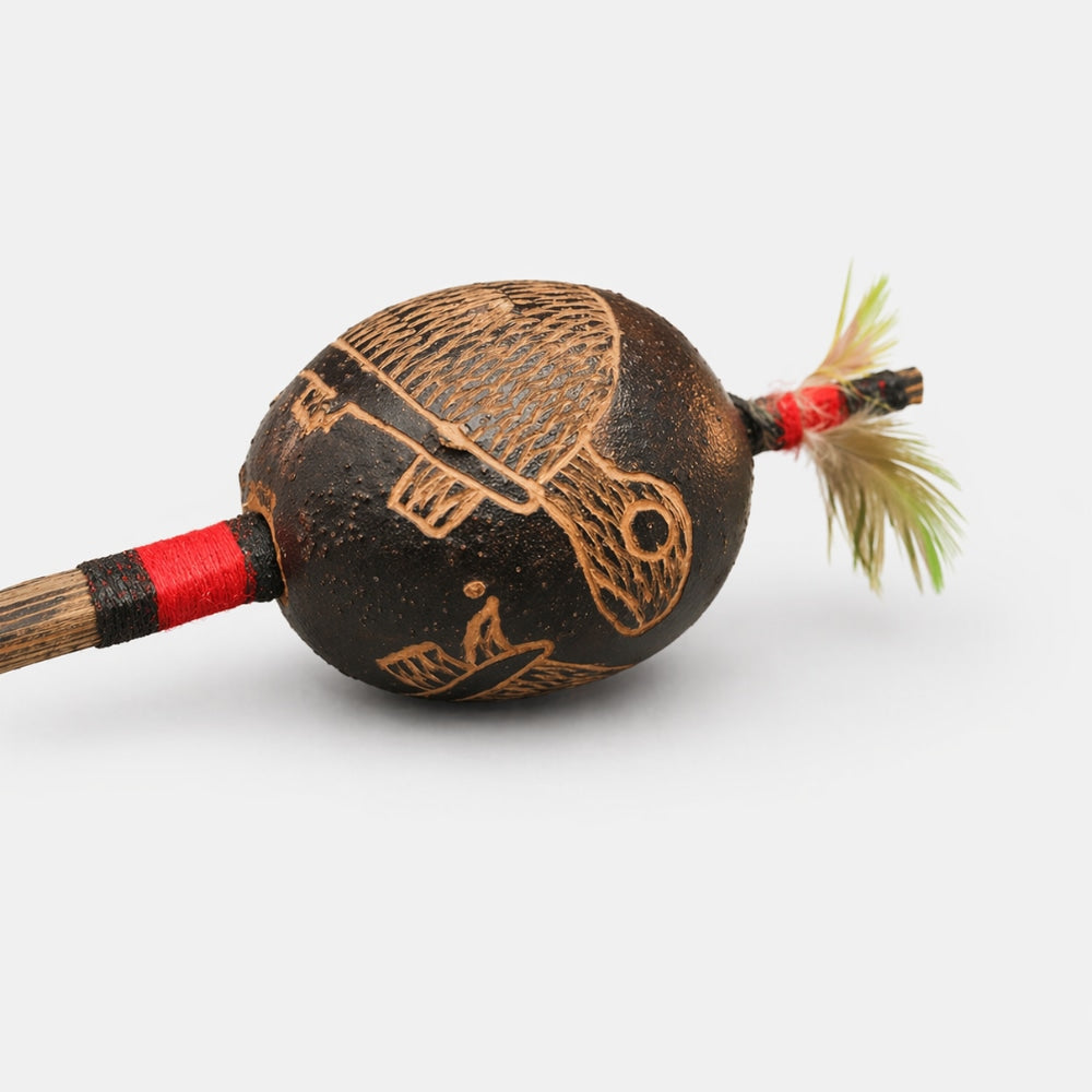 turtle carved decoration on shipibo shaker 