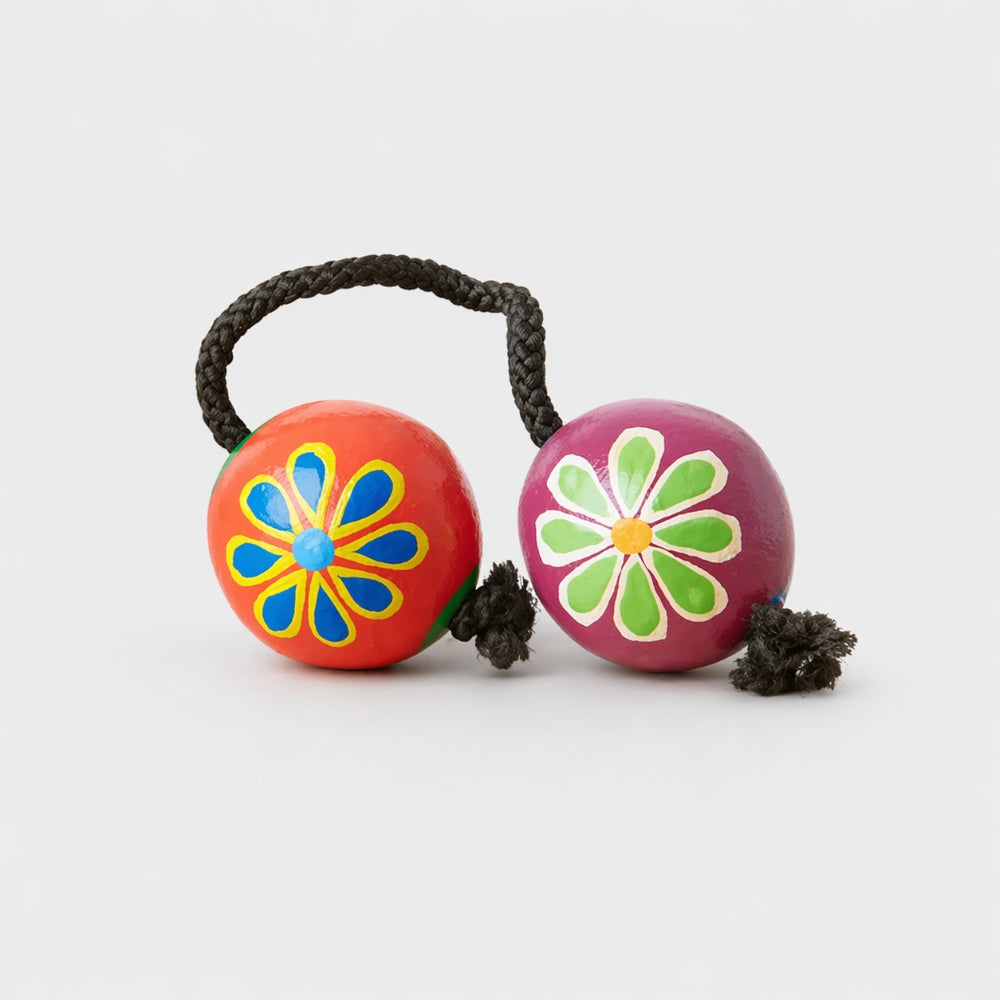 floral painted kashaka shakers on grey background 