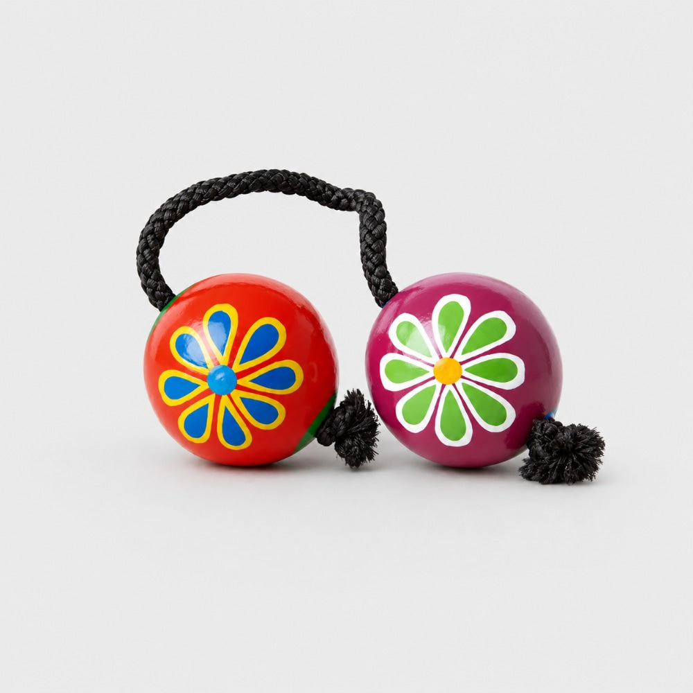 floral painted kashaka shakers on light grey studio background 