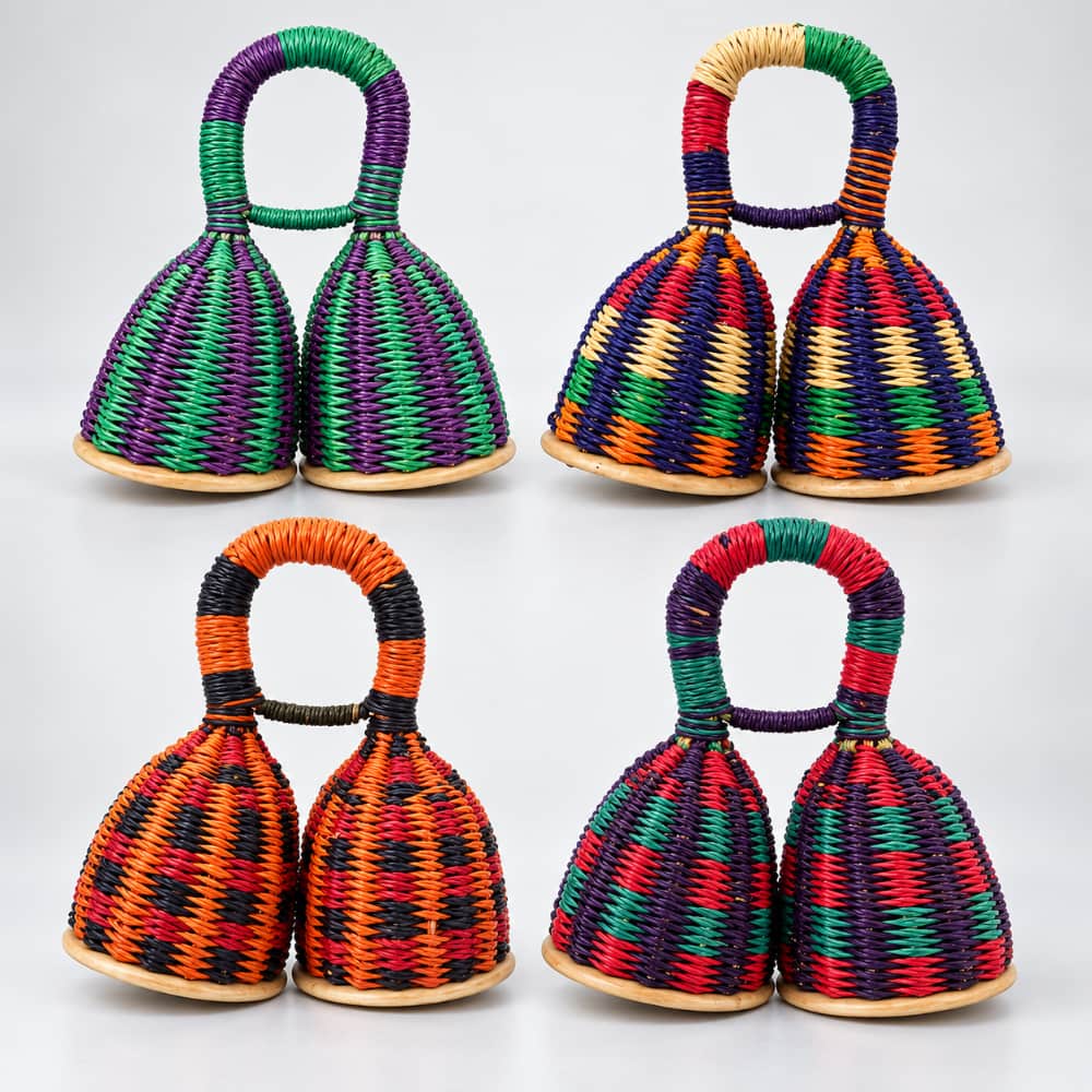 Four handmade African double caxixi shakers featuring unique woven colour combinations and patterns, showing natural variations in design.