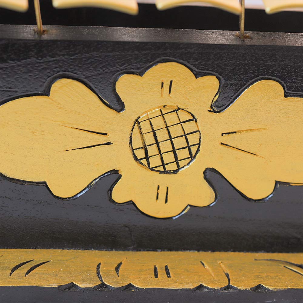 close up of flower design gangsa gamelan 