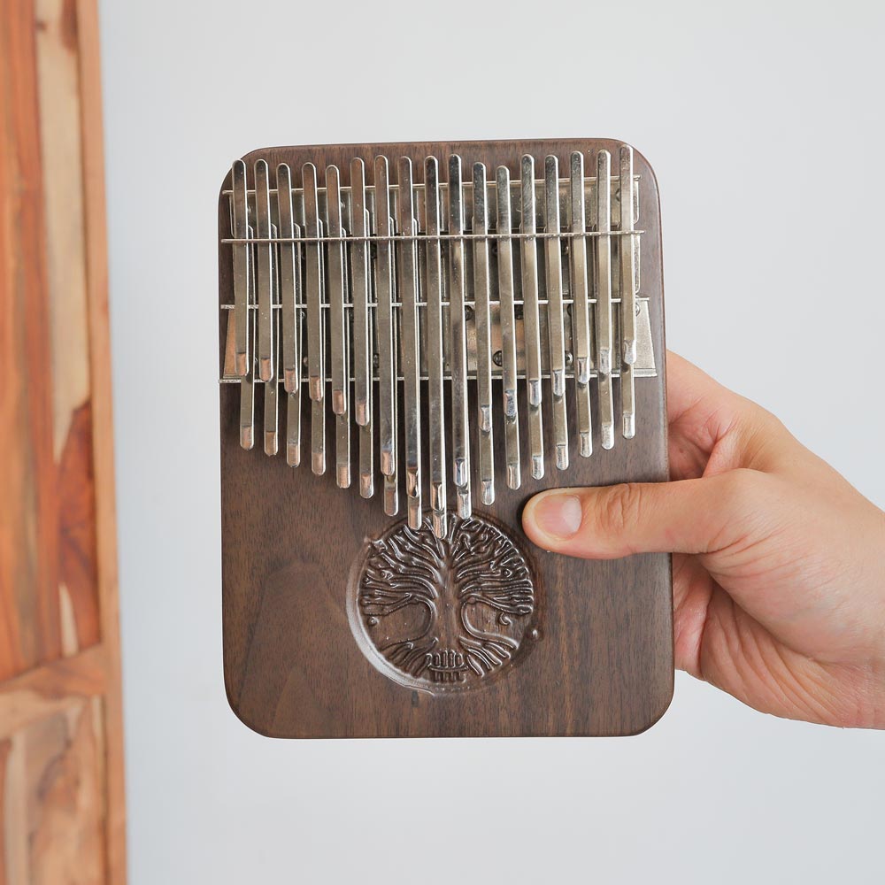 handheld scale image of hluru kalimba 