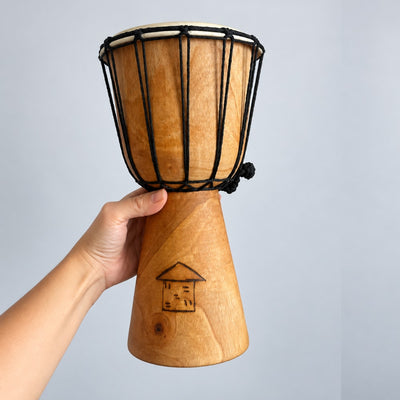 hand holding drum