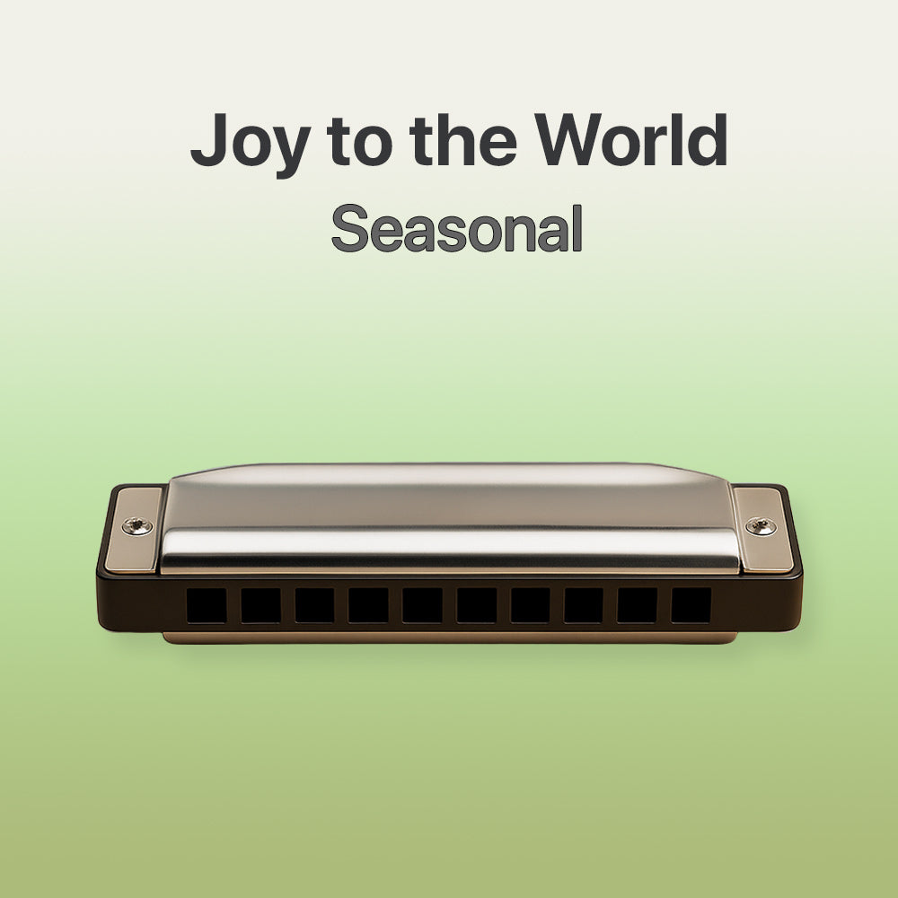 Harmonica on a light green background with text 'Joy to the World Seasonal'.