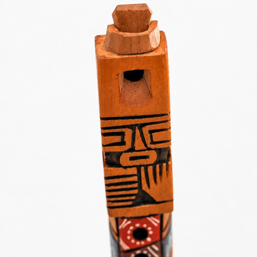 close up of tarka flute blow hole on a light grey studio background