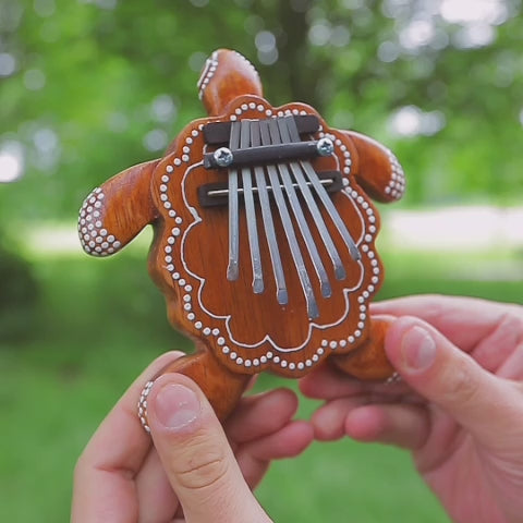 Turtle-shaped thumb piano kalimba sound demonstration