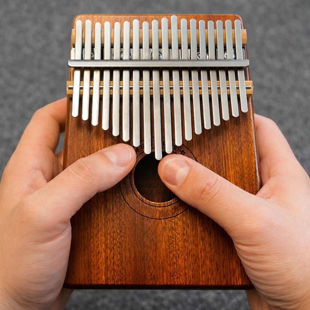 Kalimba beginner course trailer showing how to play first song step by step